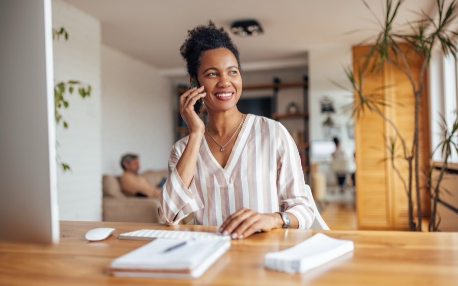 A member of the Home Haven team taking a call at her desk